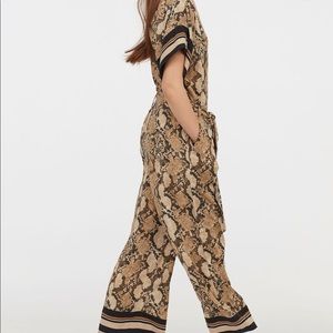 H&M jumpsuit. Beige snakeskin pattern size 2
